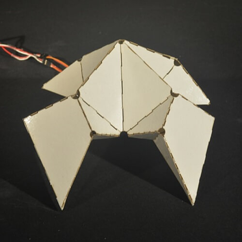 CREASE Synchronized Gait Through Folded Geometry