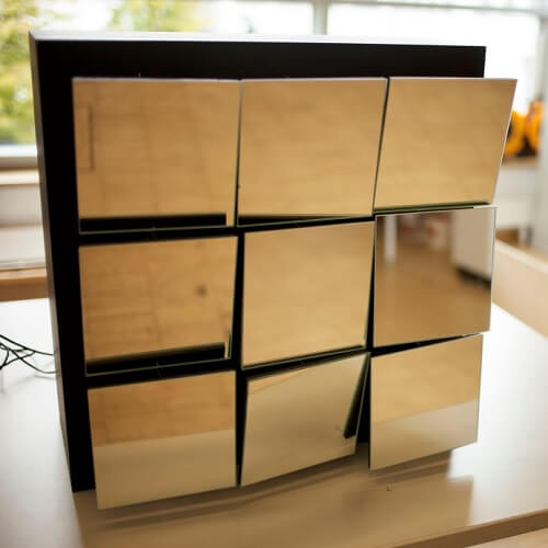 Kinetic Mirror Facade